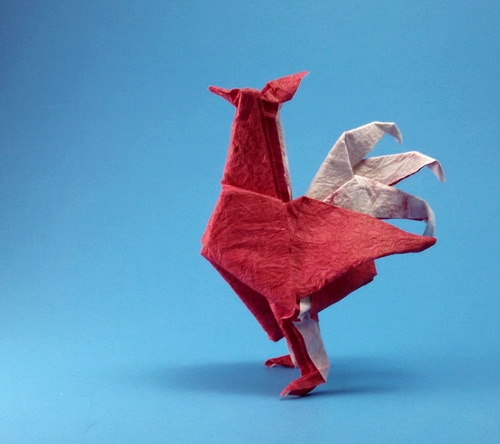 Origami Chicken by John Montroll. Folded from a square of Crinkle Hot Pink scrapbooking paper by Gilad Aharoni on giladorigami.com